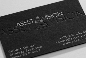 Asset Vision - ražba vtlačená do černého kartonu